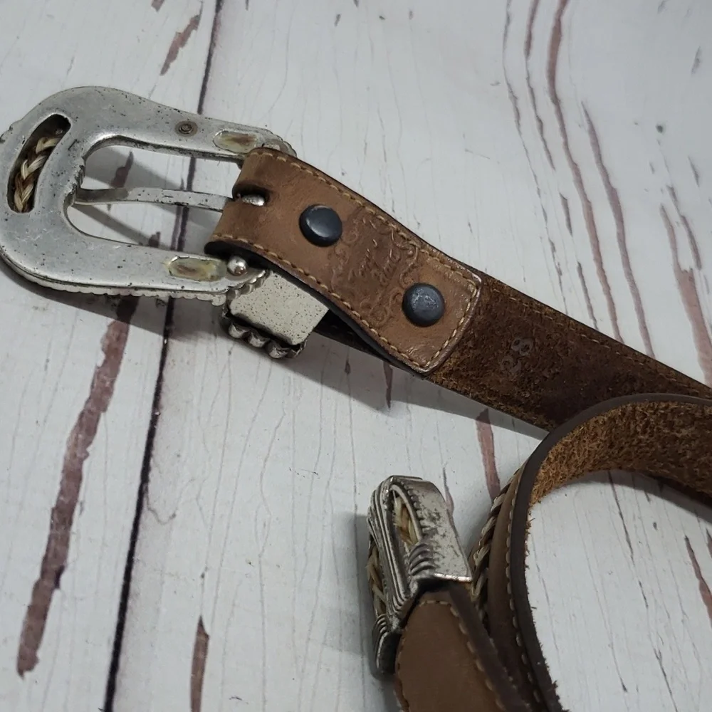 Tony Lama brown leather with breided real animal hair détails size 28